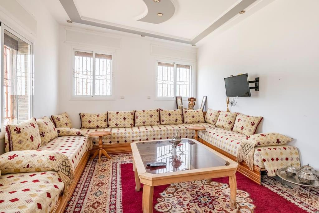 Posezení v ubytování Villa avec vue sur mer