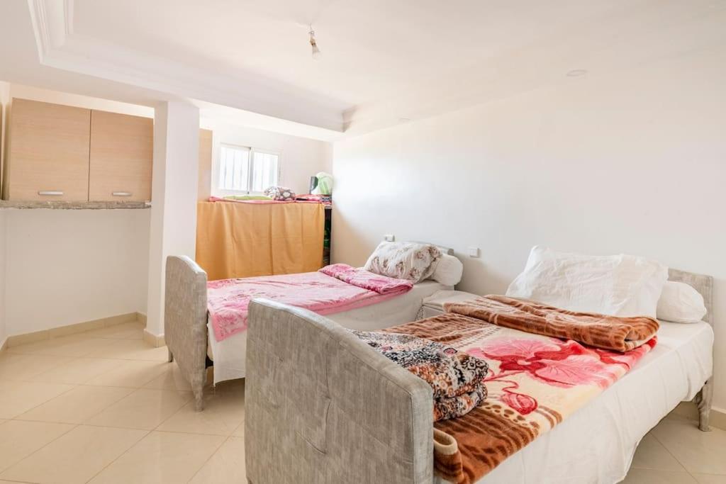 Postel nebo postele na pokoji v ubytování Villa avec vue sur mer