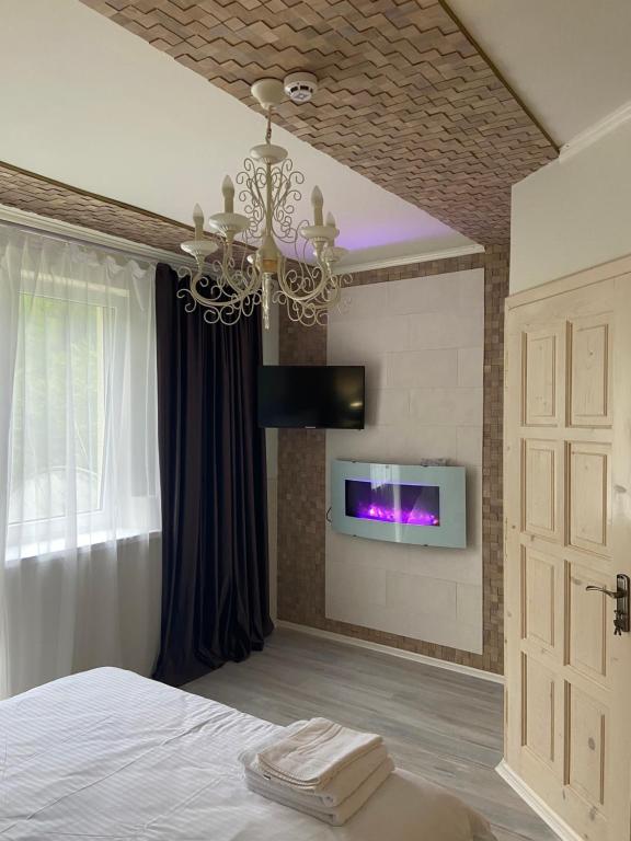 TV a/nebo společenská místnost v ubytování Hotel Tys