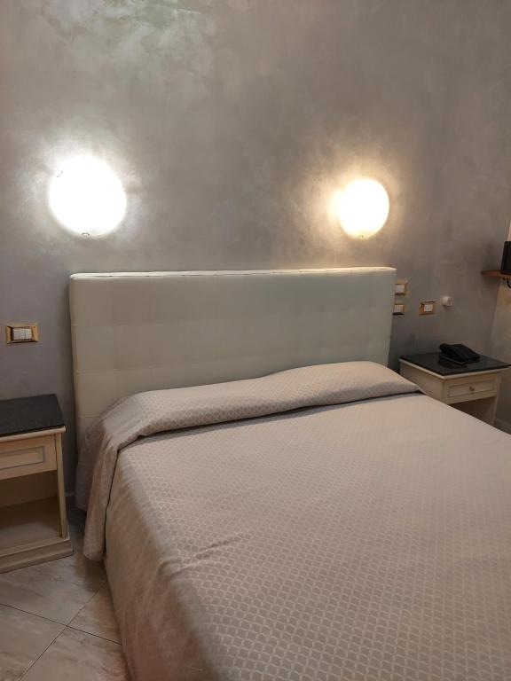 Cama o camas de una habitación en Hotel Antico Distretto