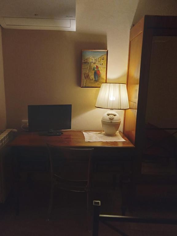 Telewizja i/lub zestaw kina domowego w obiekcie San Nicolò Holiday Home