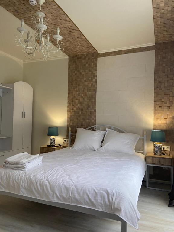 Postel nebo postele na pokoji v ubytování Hotel Tys
