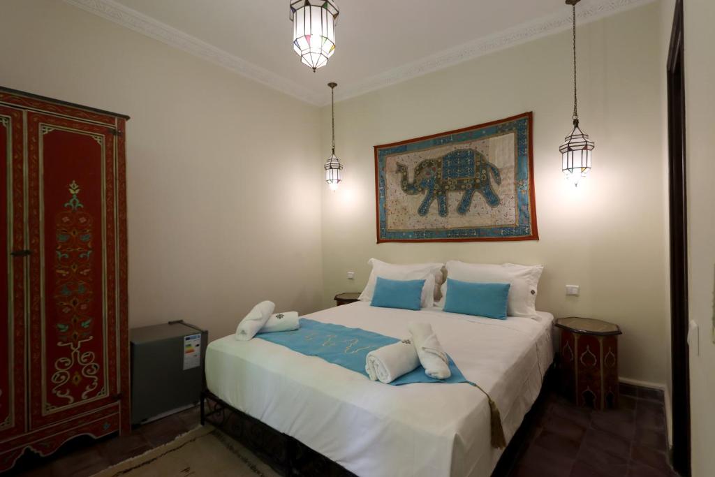 Postel nebo postele na pokoji v ubytování Riad 22 - L'Etoile d'Orient