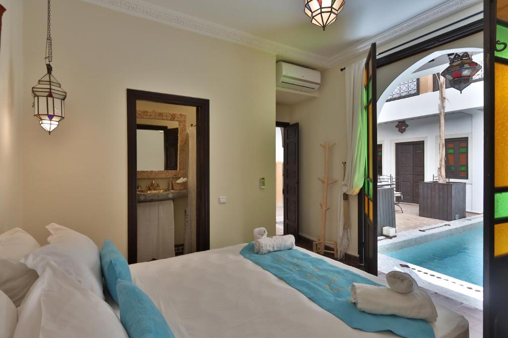 Postel nebo postele na pokoji v ubytování Riad 22 - L'Etoile d'Orient