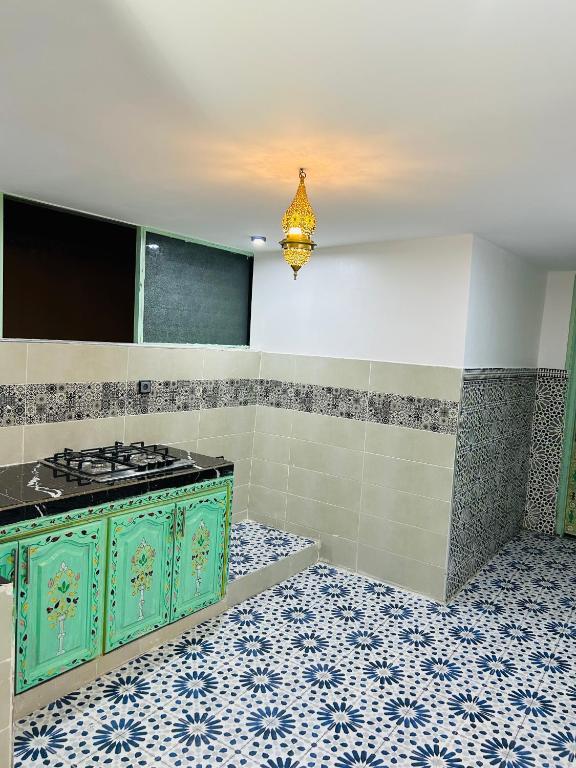 Kuchyň nebo kuchyňský kout v ubytování Riad Cascada
