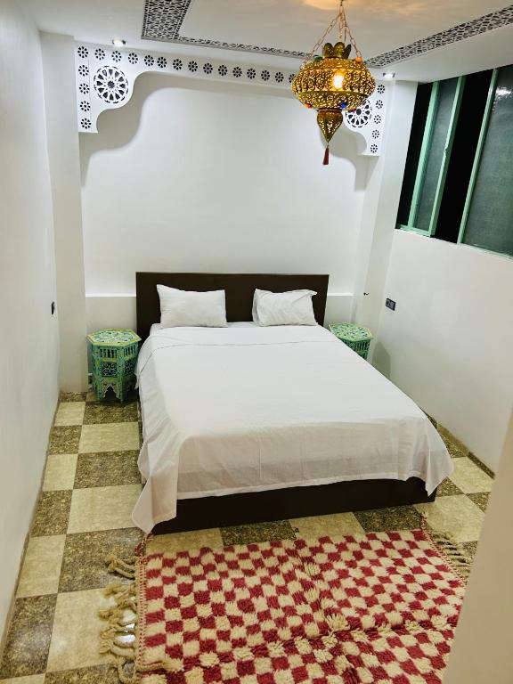 Postel nebo postele na pokoji v ubytování Riad Cascada