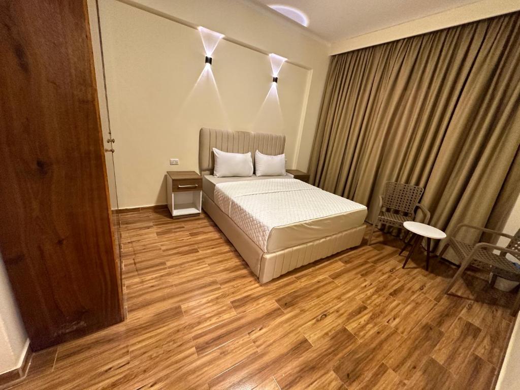 Postel nebo postele na pokoji v ubytování Egy Days Hotel