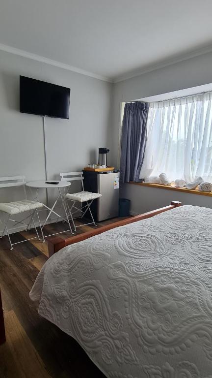 Postel nebo postele na pokoji v ubytování B&B Rocas Santo Domingo