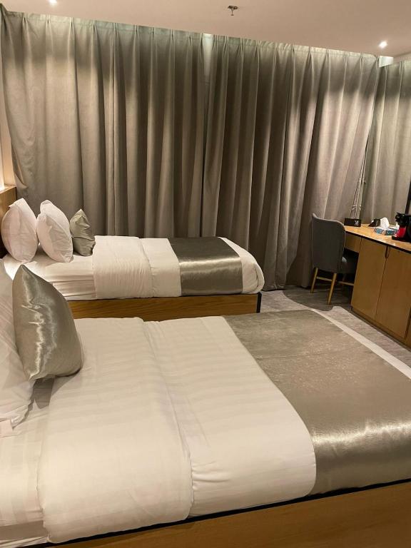 Postel nebo postele na pokoji v ubytování فندق ياز
