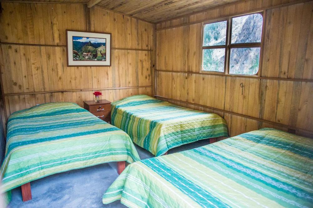 Postel nebo postele na pokoji v ubytování Llahuar Lodge