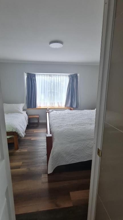 Postel nebo postele na pokoji v ubytování B&B Rocas Santo Domingo