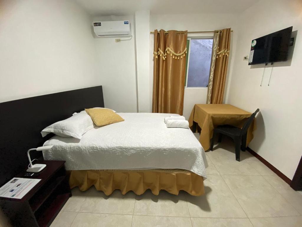 Postel nebo postele na pokoji v ubytování Casa Charlotte