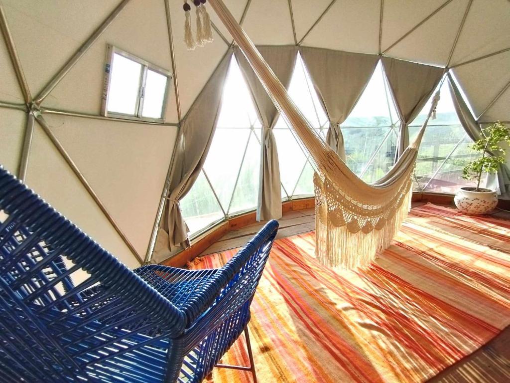 Posezení v ubytování Chichi Jamaica Glamping Hotel Campestre