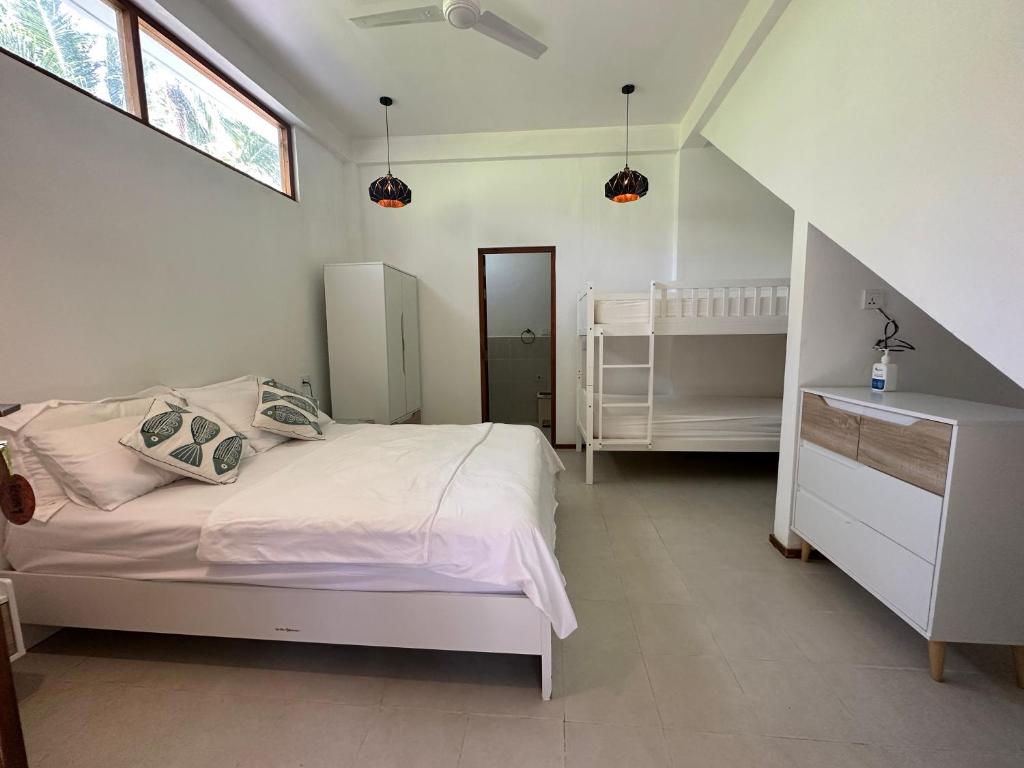 Postel nebo postele na pokoji v ubytování Aqua oasis