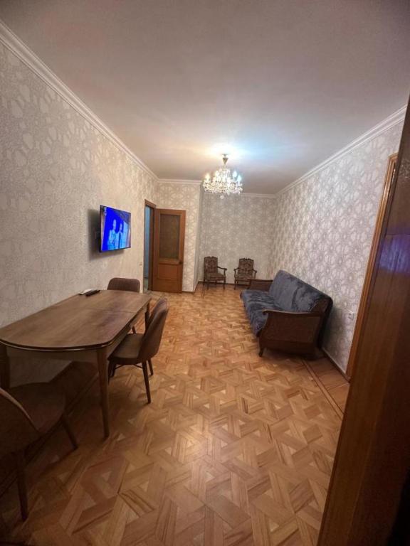 TV a/nebo společenská místnost v ubytování Apartment George