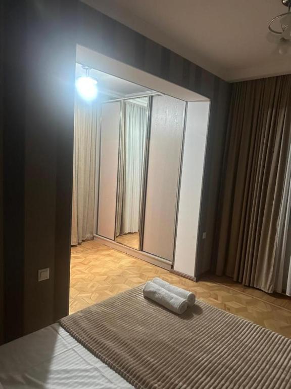 Postel nebo postele na pokoji v ubytování Apartment George