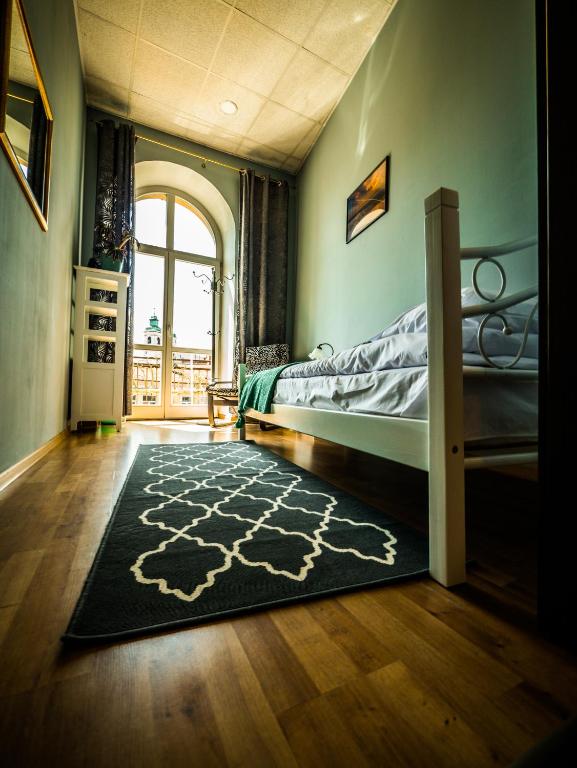 Postel nebo postele na pokoji v ubytování Hostel Pod Basztą