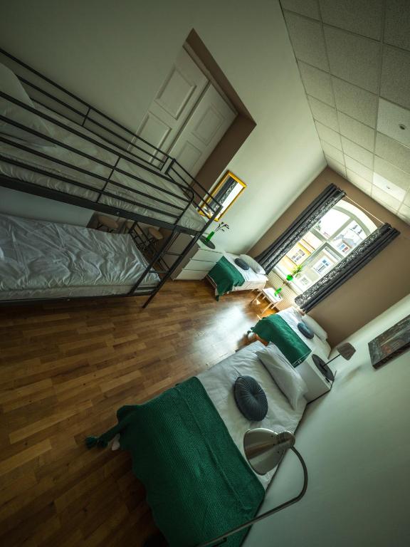 Postel nebo postele na pokoji v ubytování Hostel Pod Basztą