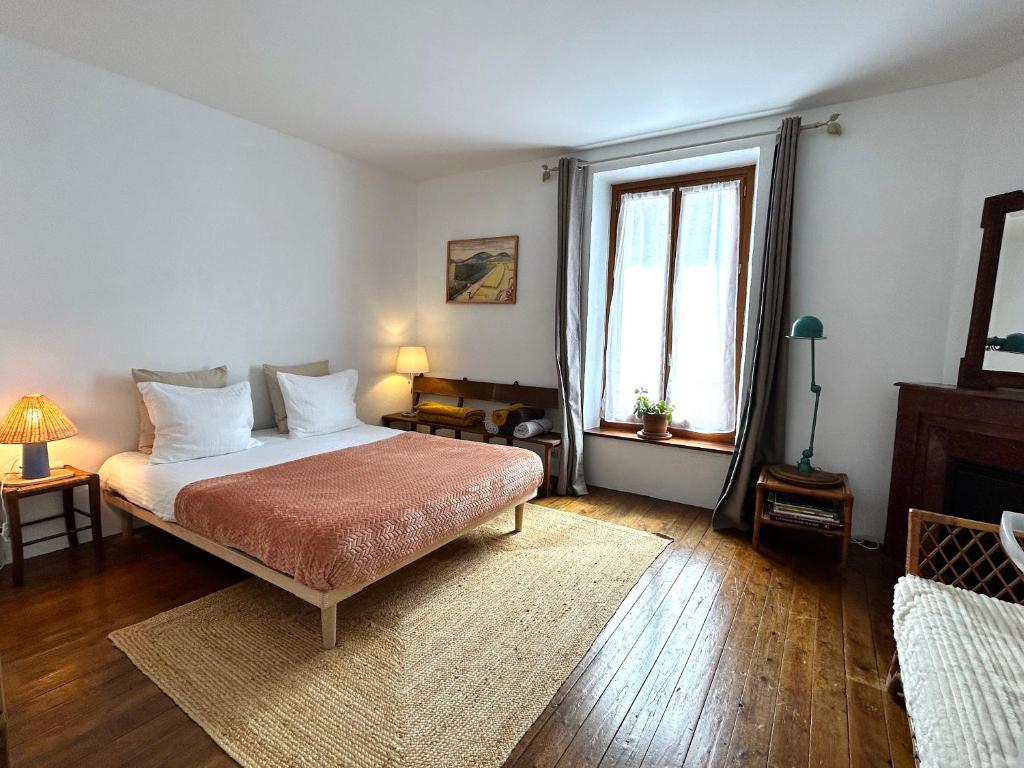 Postel nebo postele na pokoji v ubytování La Bycoque, maison au calme près de Fontainebleau
