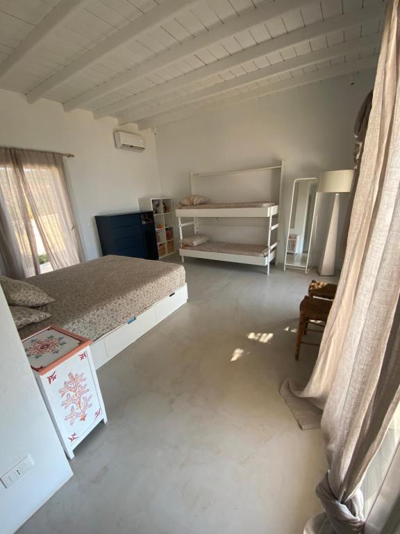 Postel nebo postele na pokoji v ubytování Villa Baldin