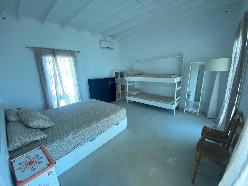 Postel nebo postele na pokoji v ubytování Villa Baldin