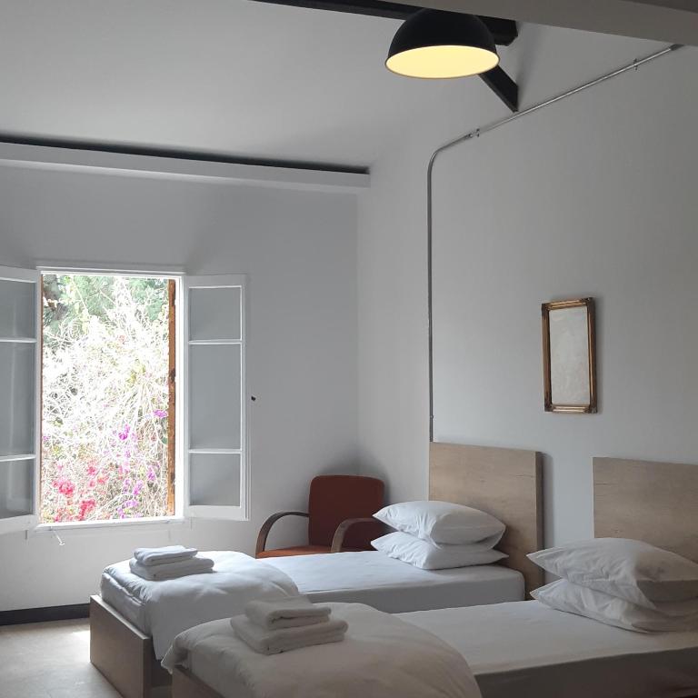 Postel nebo postele na pokoji v ubytování Sabor Residence