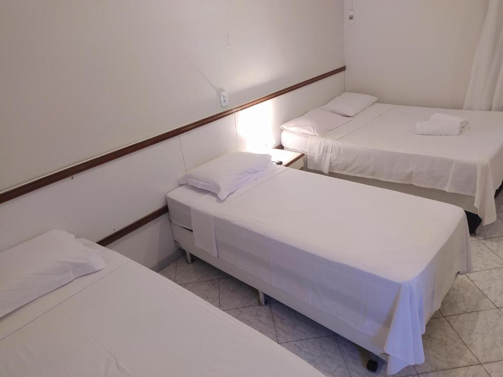 Postel nebo postele na pokoji v ubytování Pousada Aruamar