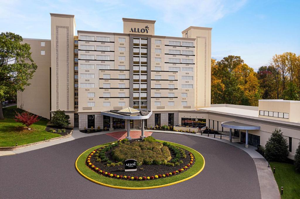 a hotel with a large building with a circular driveway at The Alloy, a DoubleTree by Hilton - Valley Forge in King of Prussia