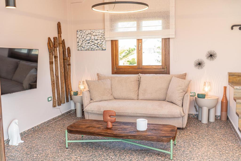 Posezení v ubytování Pink Panther Maisonette Suite