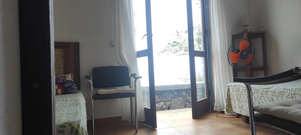 TV a/nebo společenská místnost v ubytování Casa Praia Tarrafal de Monte Trigo