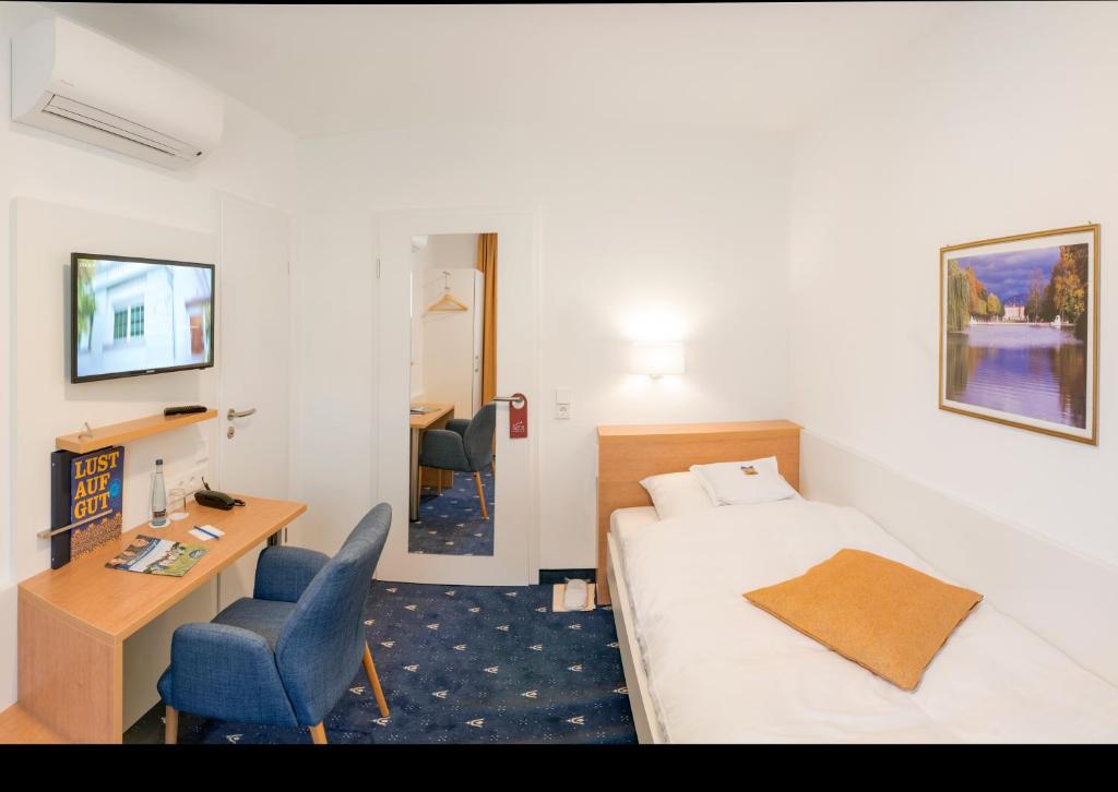 TV a/nebo společenská místnost v ubytování Hotel Adler Post