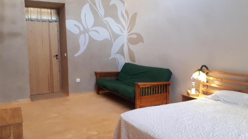 Postel nebo postele na pokoji v ubytování Mas la Llum, la casa de palla
