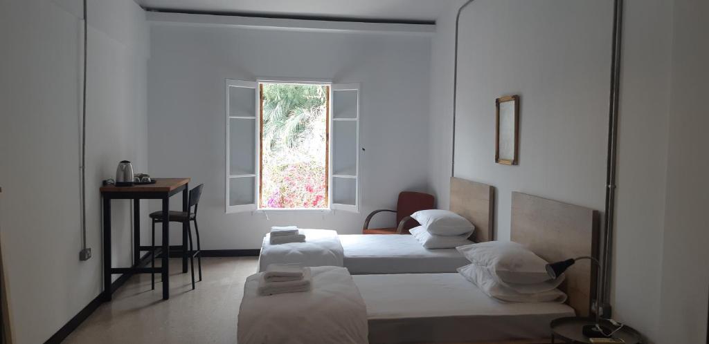 Postel nebo postele na pokoji v ubytování Sabor Residence