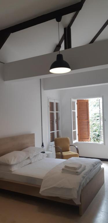 Postel nebo postele na pokoji v ubytování Sabor Residence