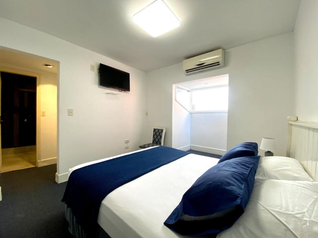 Postel nebo postele na pokoji v ubytování Hotel Renty Beach
