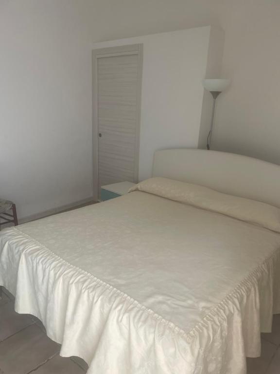 Ein Bett oder Betten in einem Zimmer der Unterkunft Sant’Anna arresi