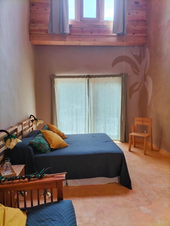 Postel nebo postele na pokoji v ubytování Mas la Llum, la casa de palla