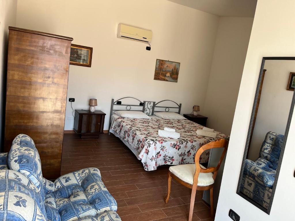 Postel nebo postele na pokoji v ubytování B&B Piandelidei