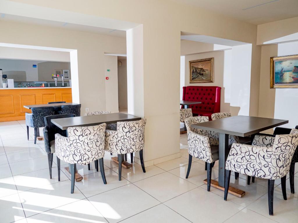 Posezení v ubytování Pela Maria Hotel