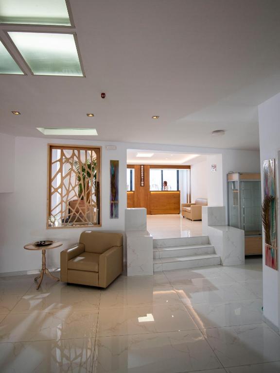 Posezení v ubytování Pela Maria Hotel