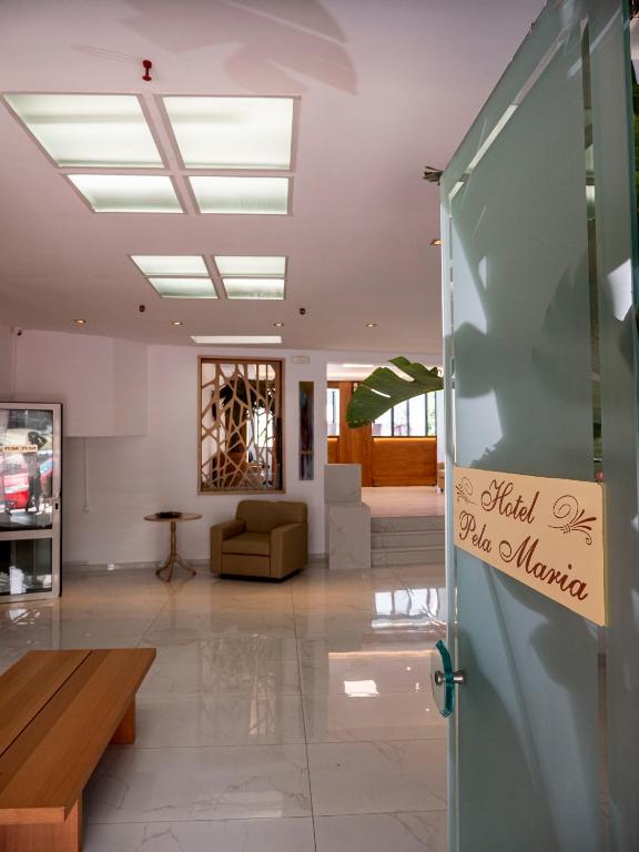 Posezení v ubytování Pela Maria Hotel