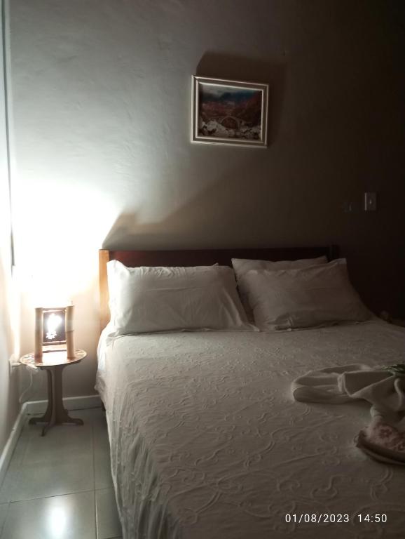 Postel nebo postele na pokoji v ubytování Pousada Longe Vista