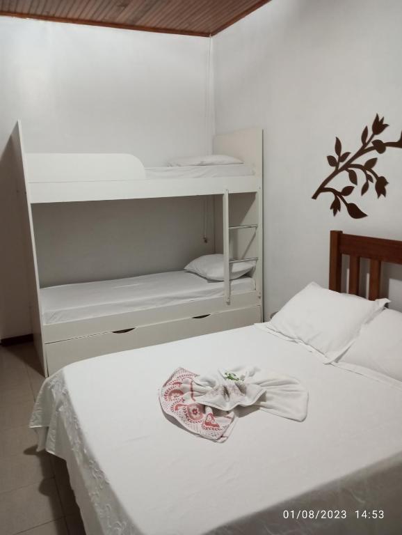 Postel nebo postele na pokoji v ubytování Pousada Longe Vista