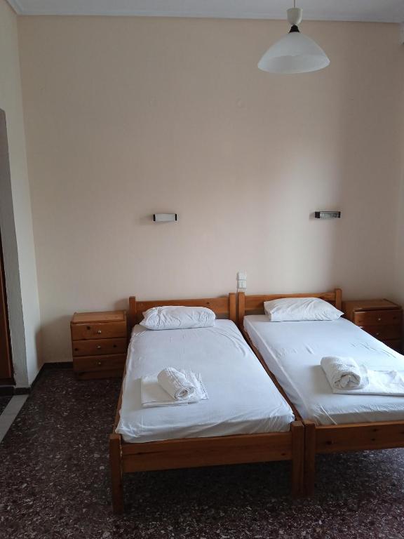 Postel nebo postele na pokoji v ubytování PANAGIOTIS