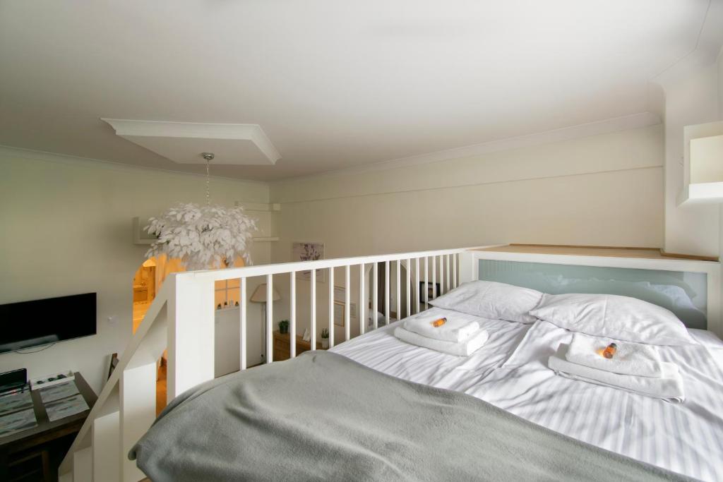 Posteľ alebo postele v izbe v ubytovaní Stylish 2 bedroom apartment Morsztynowska street