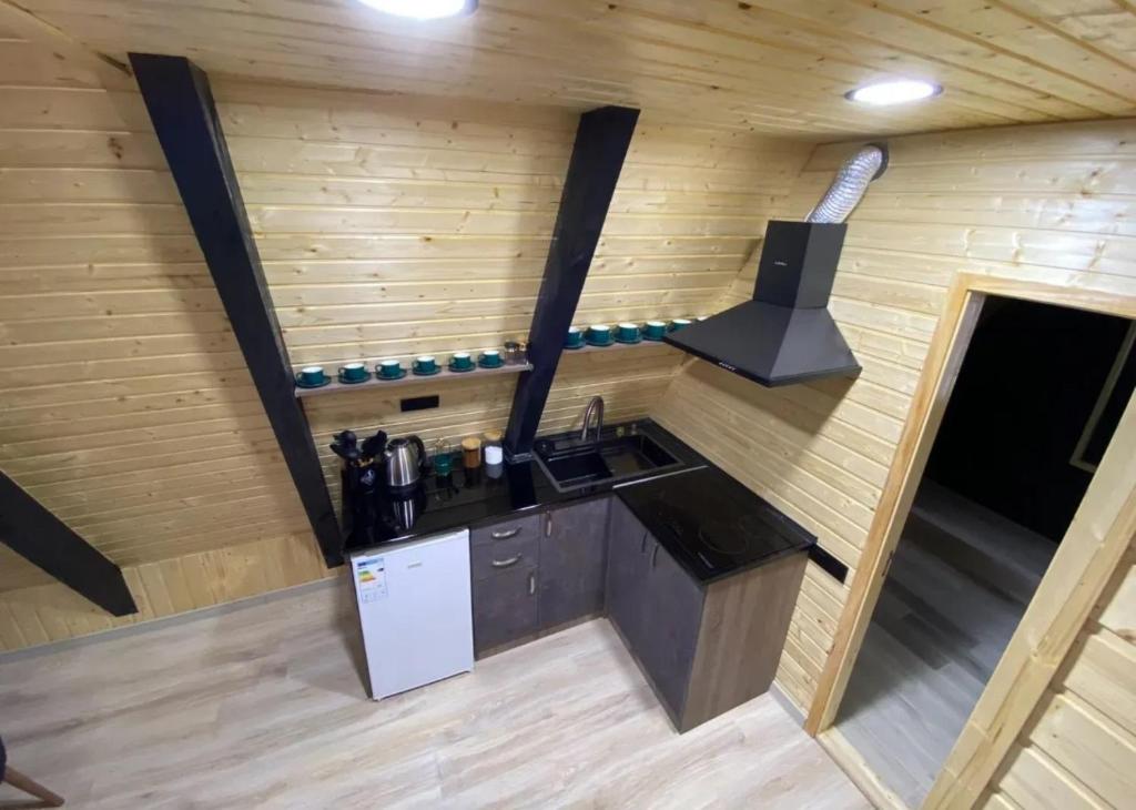 an overhead view of a kitchen in a tiny house at Cozy Cottage Dilijan Arg in Dilijan