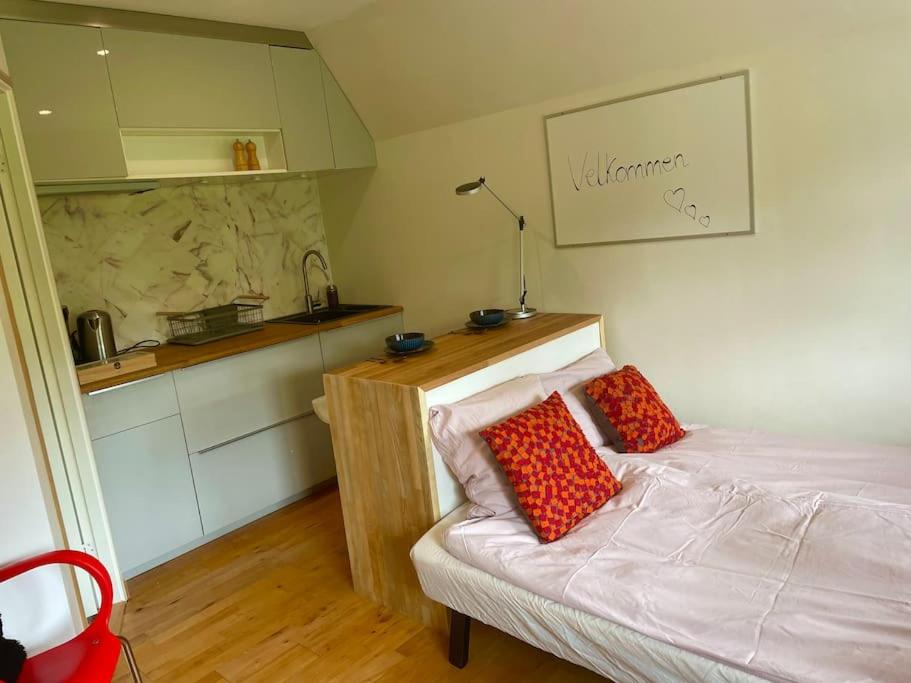 Postel nebo postele na pokoji v ubytování The Whispering Apple Nordisk Retreat Lejlighed på Fyn