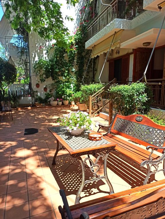 A garden outside Papadioti Apartments