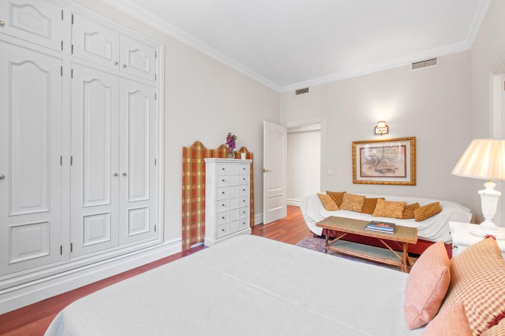 Postel nebo postele na pokoji v ubytování UALIDIA GOLF Suites