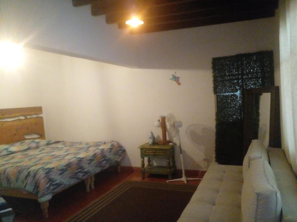 Postel nebo postele na pokoji v ubytování Casa xocolatl